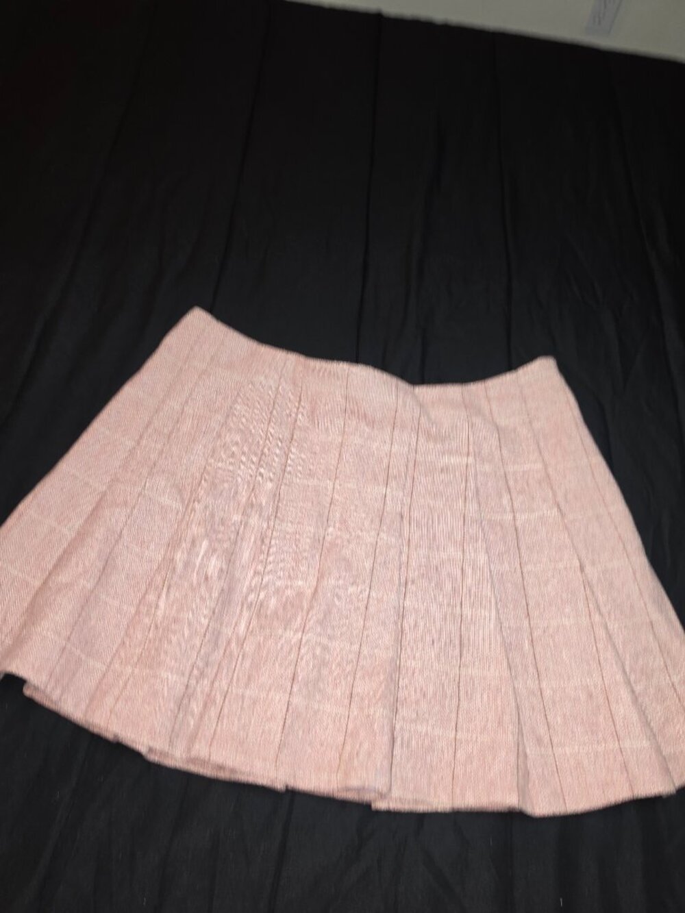 pink/khaki pleated mini skirt with a subtle pattern
